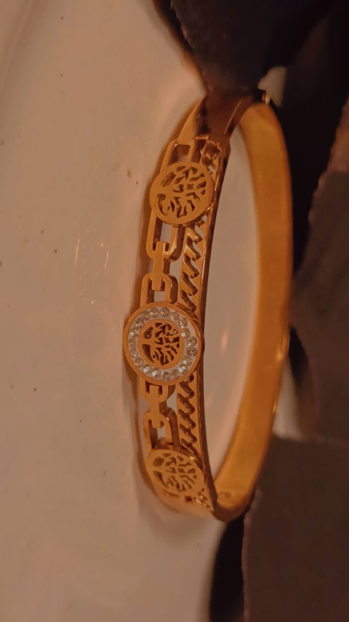 Elegant tree of life gold bracelet with crystal accents and elegant finish