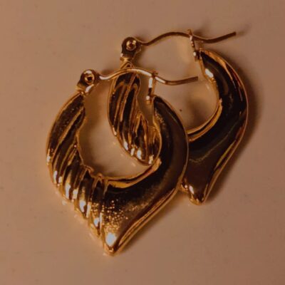 Elegant gold wave hoop earrings with anti-tarnish finish