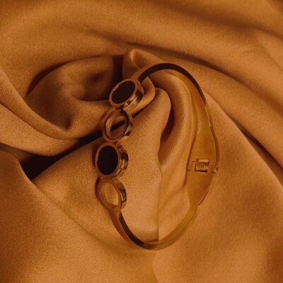 Triple circle gold bracelet with a glossy finish and anti-tarnish coating