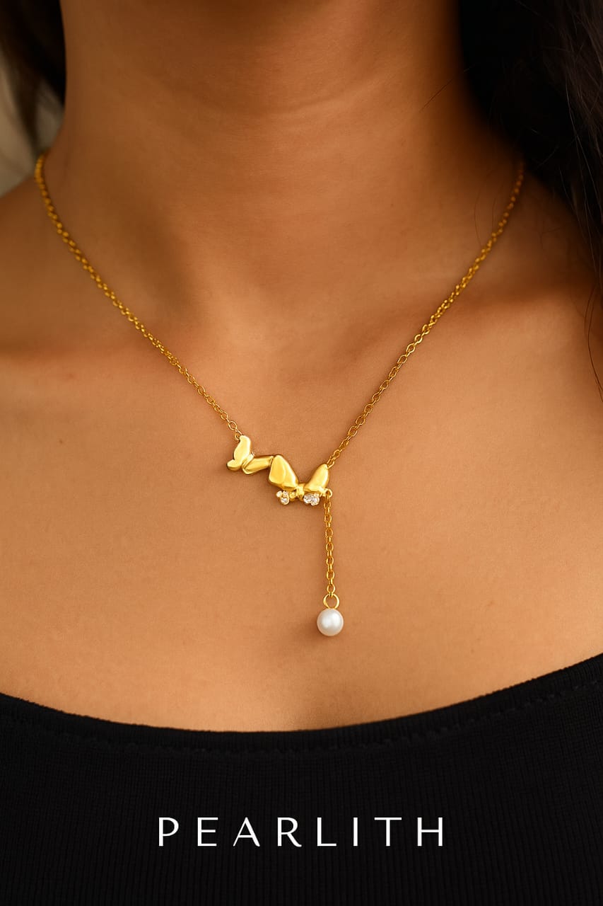 Butterfly charm necklace with pearl drop chain