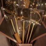 Golden jewelry bouquet with stainless steel accessories and fairy light